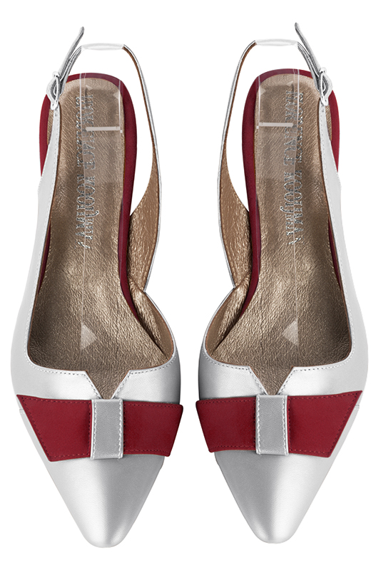 Light silver women's open back shoes, with a knot. Tapered toe. Low comma heels. Top view - Florence KOOIJMAN